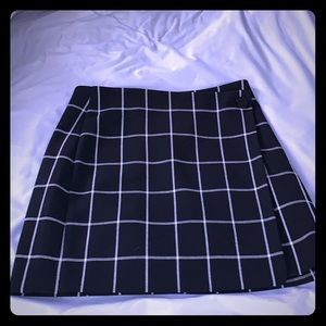 Black pleated mini pencil skirt
